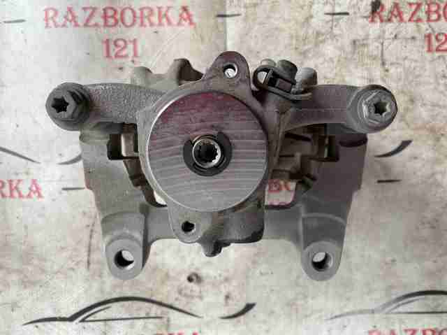 Супорт гальмівний задній правий 8W0615404A VAG
