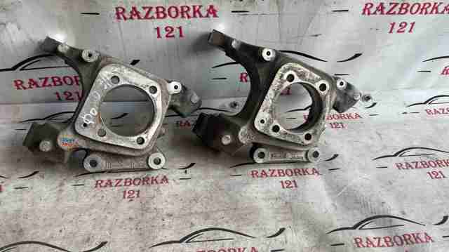 Кулак поворотний лівий DG9Z5B759B FORD
