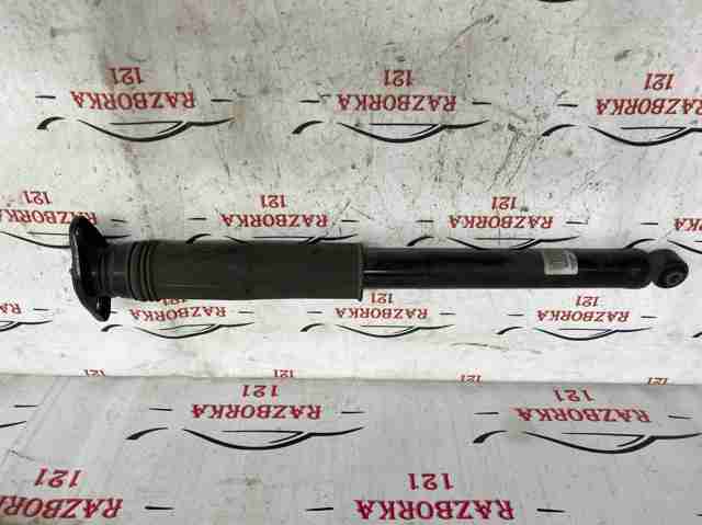 Амортизатор задньої підвіски E62105RW0B NISSAN