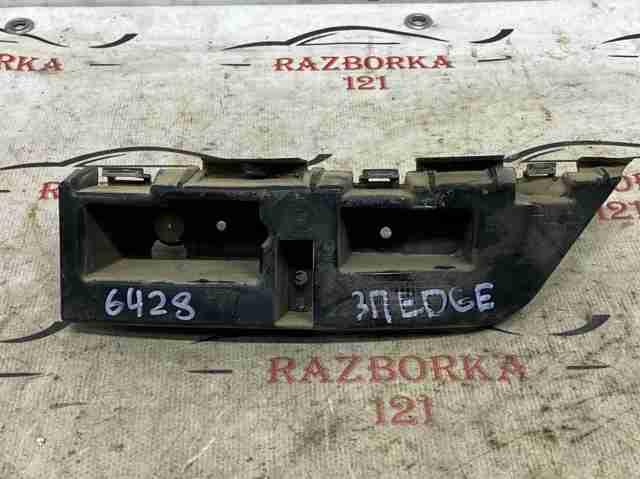 Кронштейн бампера заднього, правий KT4Z17D942A FORD