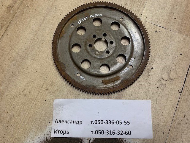 Маховик із зубчастим ободом в зборі 123311W200 NISSAN