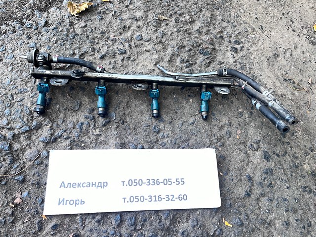Форсунка вприску палива 1571065J00 SUZUKI