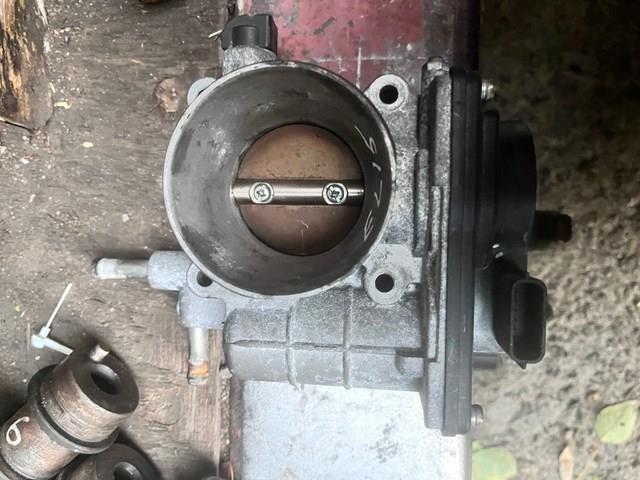Блок дросельної заслінки 16112AA220 SUBARU