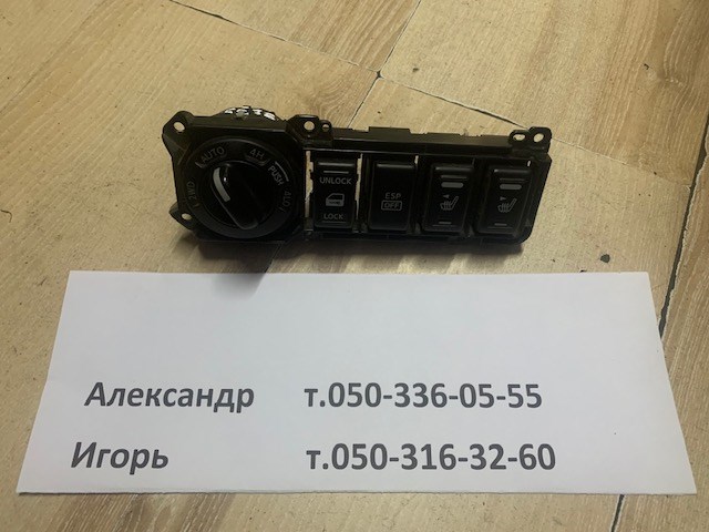 Кнопка блокування замка дверей 25210EB300 NISSAN