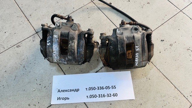 Супорт гальмівний, передній, правий 410011AA0A NISSAN