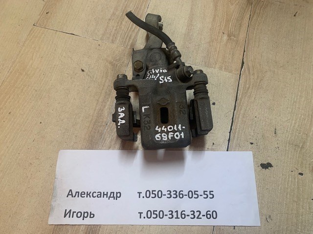 Задній гальмівний супорт лівий 4401169F01 NISSAN