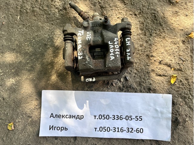 Задній гальмівний супорт лівий 44011JA01A NISSAN