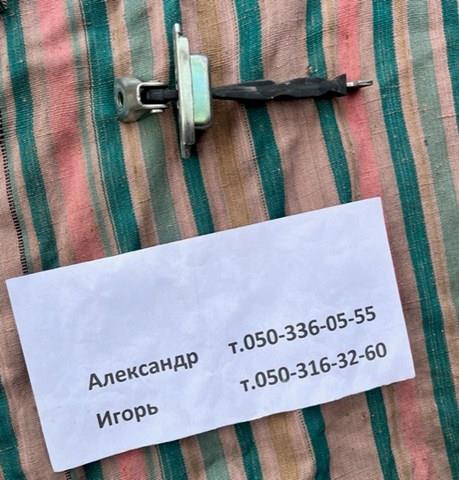 Обмежувач відкриття дверей, задній 5732A094 MITSUBISHI
