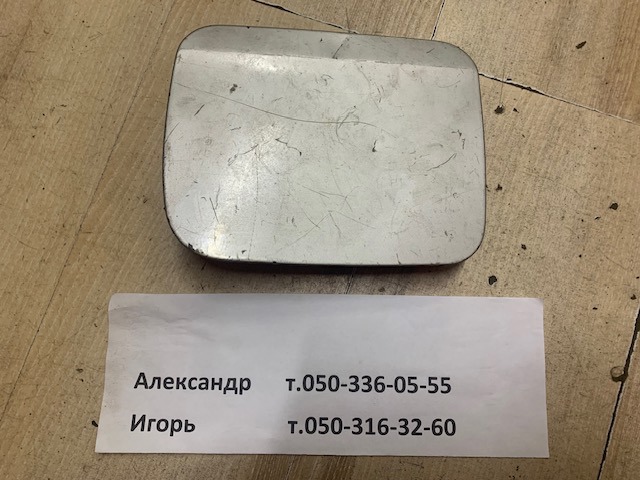 Лючок (дверцята) бензобака 57601AE010 SUBARU