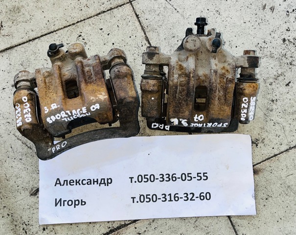 Задній гальмівний супорт лівий 582100Z300 HYUNDAI