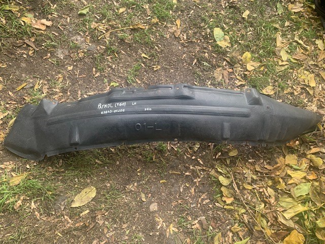 Підкрилок передній лівий 6384301J05 NISSAN