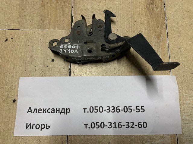 Замок капота 656013Y10A NISSAN