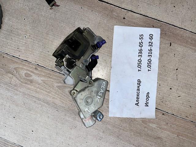 Замок задньої двері, лівої 8250395F0A NISSAN