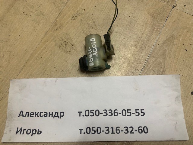 Насос омивача задній 86611AC010 SUBARU