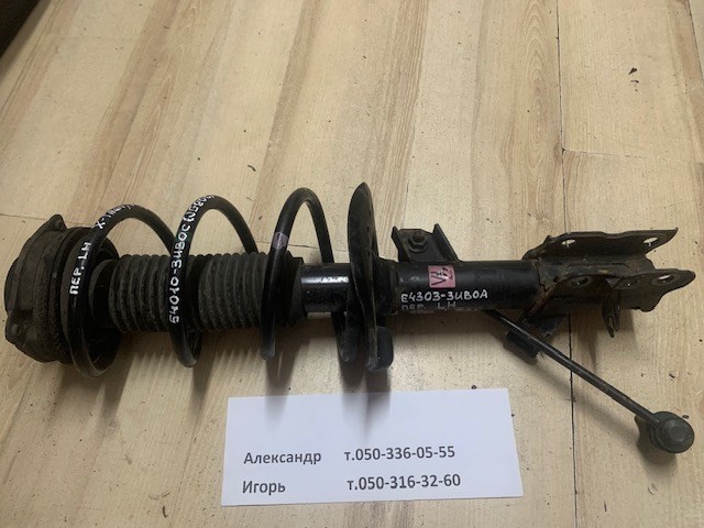 Амортизатор передньої підвіски, лівий E43033UB0A NISSAN