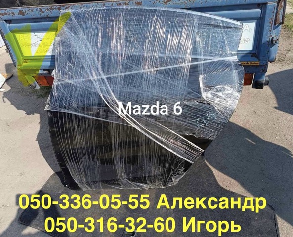 Скло задніх дверей, лівих GHK173510A MAZDA