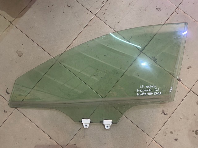 Скло водійських дверей GHP959510A MAZDA