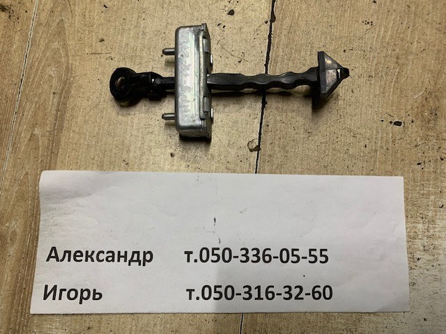 Обмежувач відкриття дверей, задній GHP972270A MAZDA