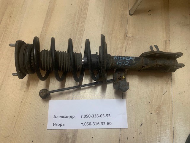 Амортизатор передньої підвіски GHT634700A MAZDA