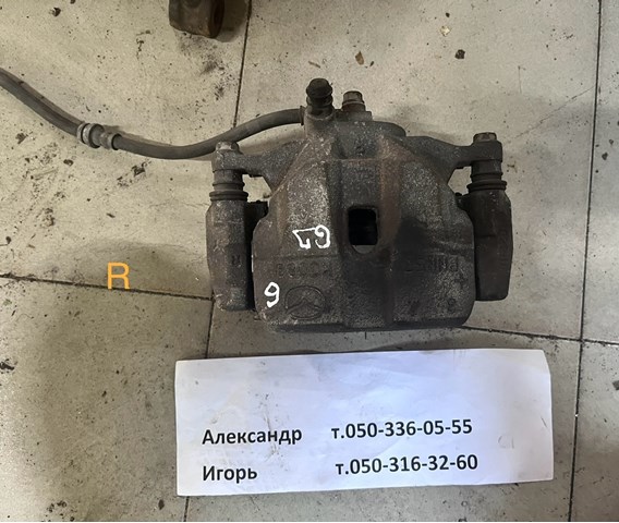 Супорт гальмівний, передній, правий GHY93398Z MAZDA
