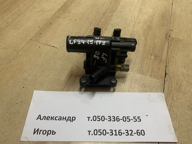 Водяний патрубок LF941517Z MAZDA