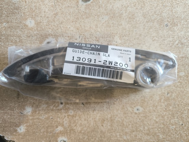 Заспокоювач ланцюга ГРМ, правий 130912W200 NISSAN