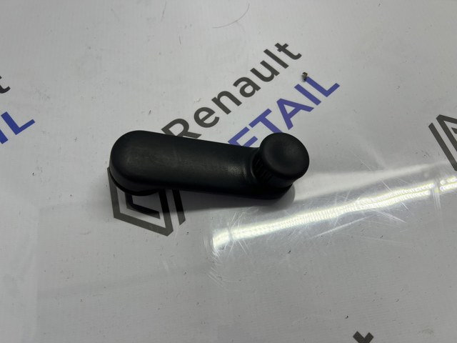 Ручка підйому скла двері, заднього 7700811387 RENAULT