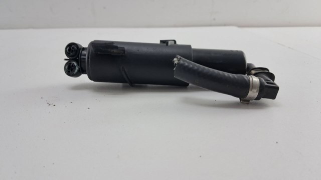 Форсунка омивача фари передньої, лівою 8T0955101A VAG