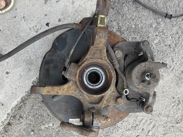 Кулак поворотний передній лівий 517152Y500 HYUNDAI