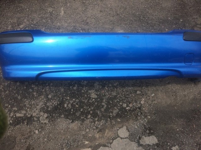 Бампер задній 850224M540 NISSAN