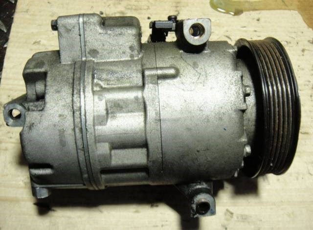 Компресор системи кондиціювання 977012W050 HYUNDAI