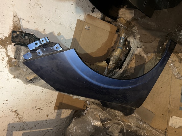 Переднє праве крило 57120SG0209P SUBARU