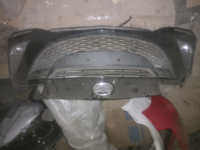 Буфер (бампер) передній BCW850031JAA MAZDA