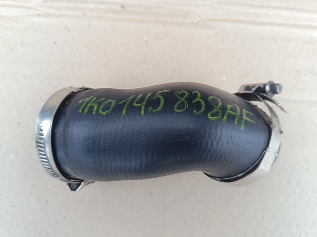 Патрубок дросельний 1K0145838AF VAG