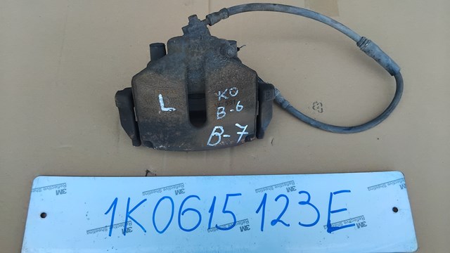 Супорт гальмівний, передній, лівий 1K0615123E VAG