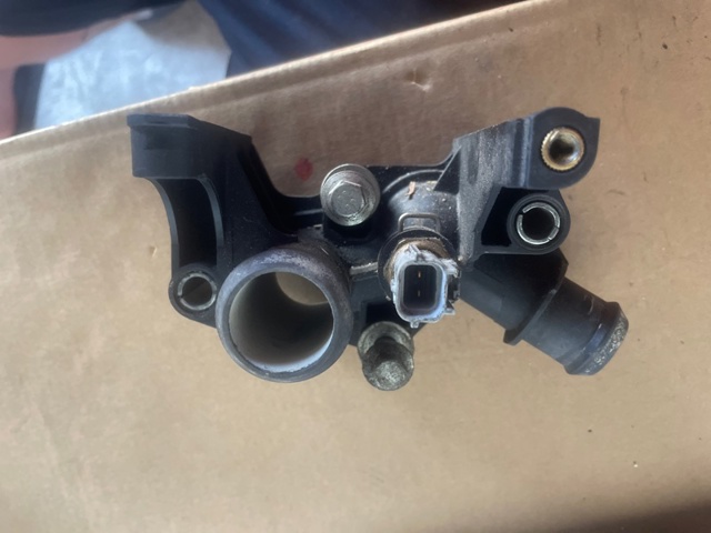 Водяний патрубок 7M5G8K556AC FORD