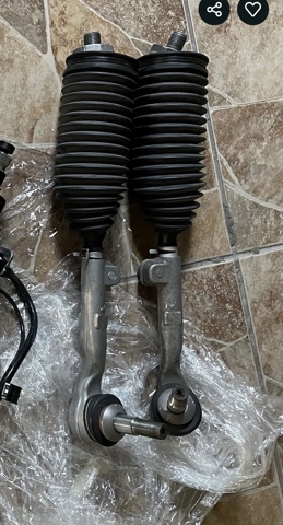 Поперечна рульова тяга ліва 32105A97054 BMW
