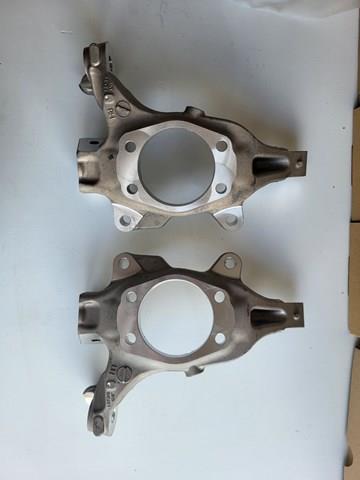 Цапфа поворотного кулака 400143JA1A NISSAN