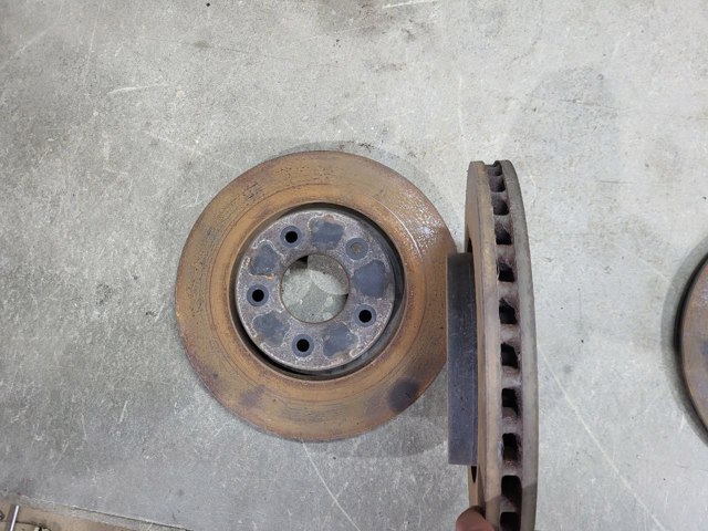 Гальмо дискове переднє 402066RR0B NISSAN