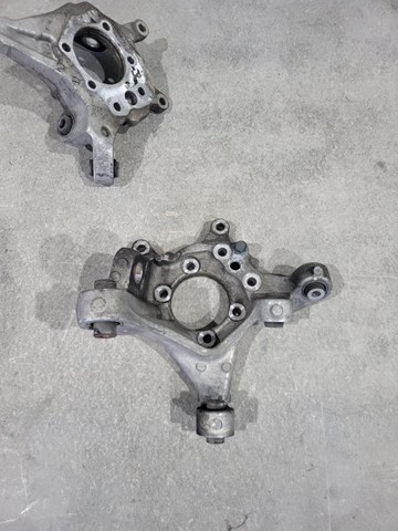 Цапфа - поворотний кулак задній, лівий 430194GA0A NISSAN