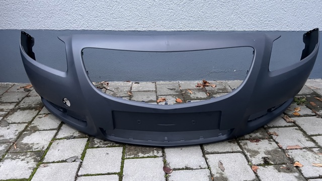 Бампер передній 13288280 OPEL