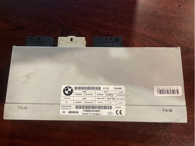 Блок управління відкриття кришки багажника 61357284597 BMW