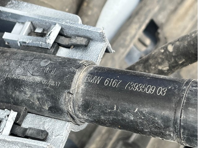 Форсунка омивача фари передньої, лівою 61677393509 BMW