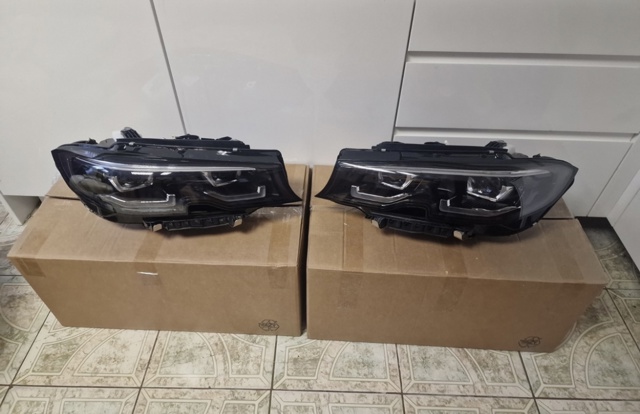 Фара ліва передня 63115A243A3 BMW