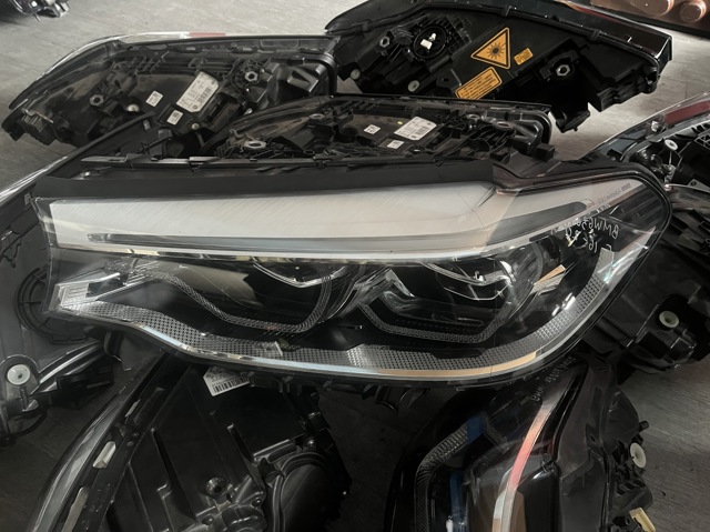 Фара ліва 63117214957 BMW