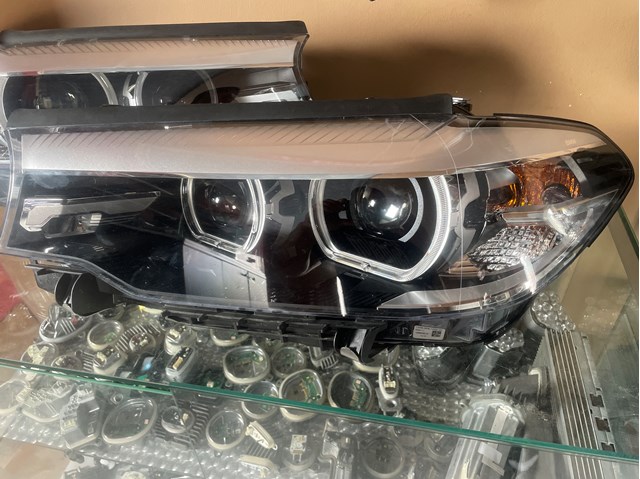 Фара ліва 63117214959 BMW