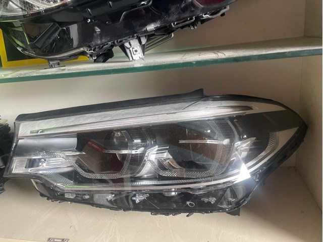 Фара ліва 63117214963 BMW