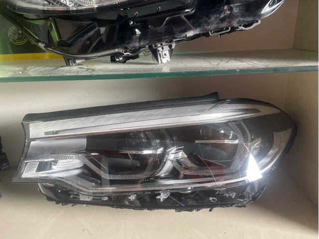 Фара ліва передня 63117214965 BMW