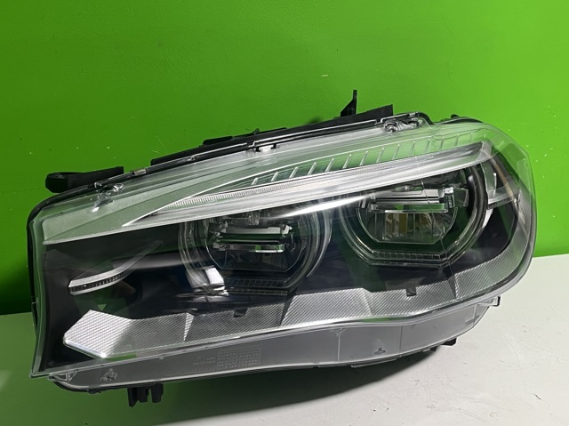 Фара ліва 63117442647 BMW