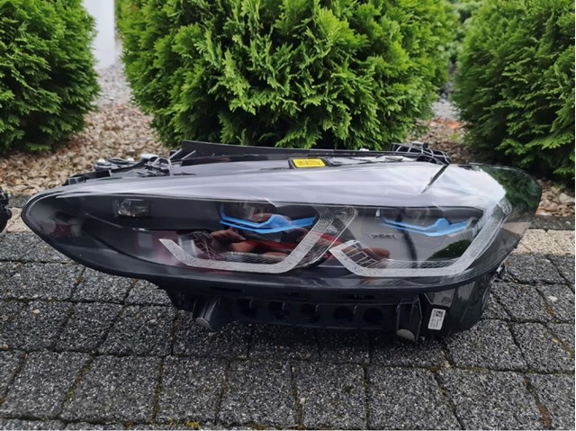 Фара основна ліва 63119851041 BMW